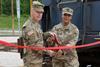 Brig Gen Daniel Duncan, Joint Munitions Command's commander, and Col Franyate Taylor, commander of Crane Army Ammunition Activity, cut a ceremonial ribbon on May 19 (Photo Randy Tisor, Crane Army Ammuniti