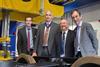 Dr Paul Allen of IRR, Chair of the Railway Division of the Institution of Mechanical Engineers Richard East, Prof Bob Cryan, Vice-Chancellor of the University of Huddersfield, and IRR Director Prof Simon Iwnicki celebrate the inauguration of the test rig.