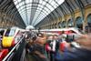 LNER trains and passengers at London King's Cross station