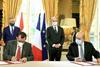 iq Prime Minister visits Paris signing