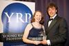 Winner: Colas Rail’s Chief Executive, Europe, Charles-Albert Giral congratulates Young Railway Professional of the Year Lucy McAuliffe of Network Rail.