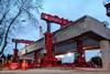 Heavy lifting contractor ALE has used its TLG1000 telescopic  hydraulic gantry for the first time to position concrete girders for the construction of a 5 km railway viaduct in Buenos Aires.