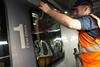 Window film being installed on a TPE train (Photo TPE)