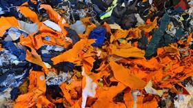 Image shows shredded hi vis clothing at Avena facility