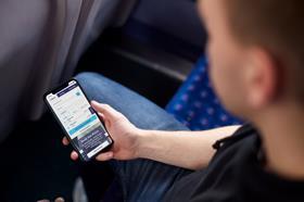 Passenger using Southeastern app on mobile phone