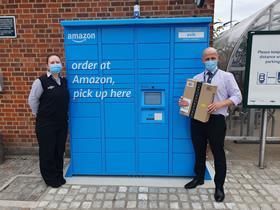 Staff at Hassocks station with the new Amazon Hub Lockers