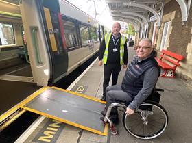 Downham Market - mobile assistance team member John Francis assists passenger Gio Strawbridge