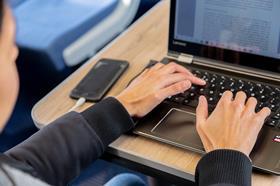 Passenger working on a TransPennine Express train (Photo TPE)