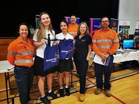 Local students Sienna Hage and Misaki Palmer with the BRC team at the Proserpine Careers Expo