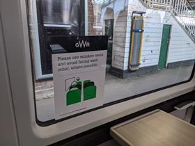 GWR Class 387 coronavirus sign on window