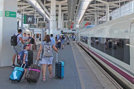 RENFE train and passengers at Valencia station