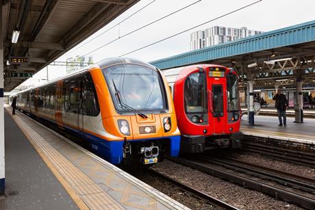 London Overground and London Underground  trains side by side (Photo TfL