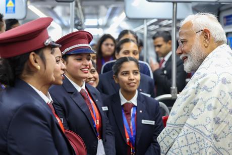 Modi and staff on RRTS (Photo PIB)