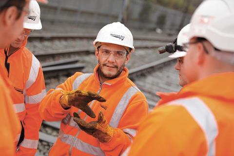 gb Network Rail engineers on the track