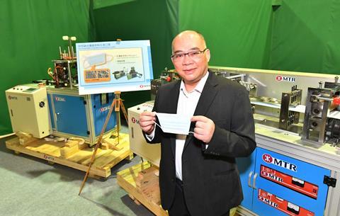Operations Director Dr Tony Lee showcases MTR Corp's face mask manufacturing facility.