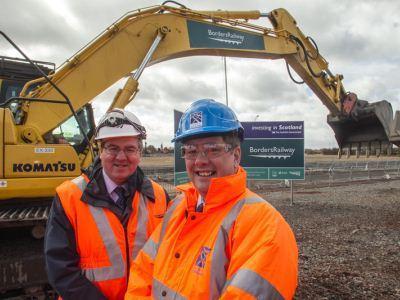 Scottish Transport Minister Keith Brown (right) and Network Rail route Managing Director for Scotland David Simpson (left) at the site of new Shawfair Station.