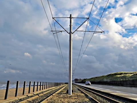 A similar GRP mast has been tested at Oostende on the Belgian coastal tram line.