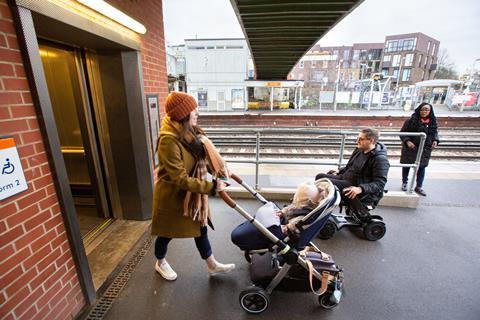 London Overground mobility scooter and pushchair user at Brockley station (Photo TfL)