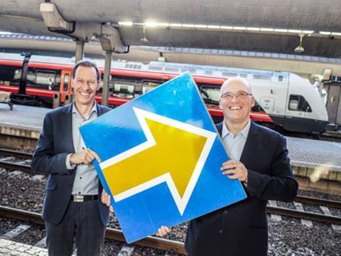 Jernbaneverket ERTMS Project Manager Eivind Skorstad and Signalling & Telecommunications Director Sverre Kjenne celebrate the ERTMS funding decision.