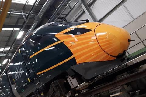 Great Western Railway has applied artwork in the form of painted face coverings to one of its Hitachi Intercity Express Trains.