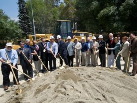 Public officials in Los Angeles take turns wielding golden spades at the Gold Line Foothill Extension groundbreaking on June 26. (Photo: LAMTA Gary Leonard)