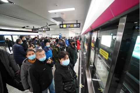 cn Qingdao metro passengers