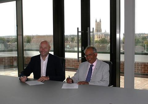 Steve Foster, Southeastern People and Culture Director and Professor Rama Thirunamachandran, CCCU Vice-Chancellor and Principal, signing the Memorandum of Understanding.
