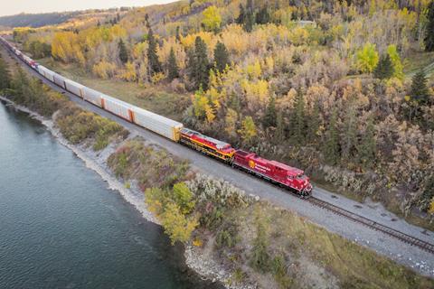 CP locomotive and a KCS locomotive on a train