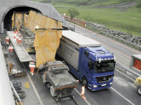 The second-hand Unimog road-rail tractor powering the spraying train has been 'wrapped' to prevent the ingress of mortar.