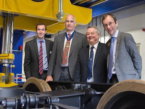 Dr Paul Allen of IRR, Chair of the Railway Division of the Institution of Mechanical Engineers Richard East, Prof Bob Cryan, Vice-Chancellor of the University of Huddersfield, and IRR Director Prof Simon Iwnicki celebrate the inauguration of the test rig.