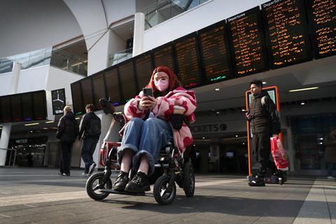 Avanti West Coast passenger with wheelchair uses the operator's Travel Companion service