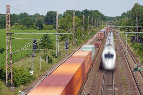 DB ICE passes freight train on Hannover to Hamburg line