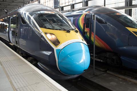 Southeastern train with a 'face covering' artwork