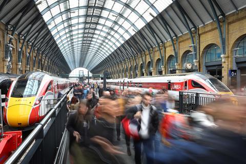 LNER trains and passengers at London King's Cross station