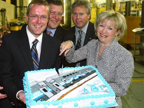 Claude Béchard, Minister and member of the Quebec National Assembly for the district, Joel Gauthier, President of AMT, Raymond Bachant, President of Bombardier Transportation North America, and Julie Boulet, Minister Transport for Québec.