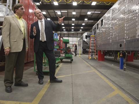 All Aboard Florida's General Counsel Myles Tobin (left) and Siemens’ Michael Cahill at Sacramento, where the manufacturer is currently assembling electric locos for Amtrak.