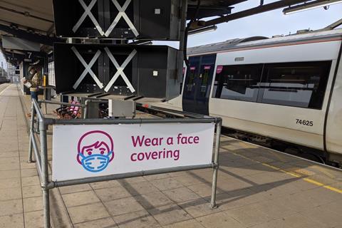 Wear a face covering sign