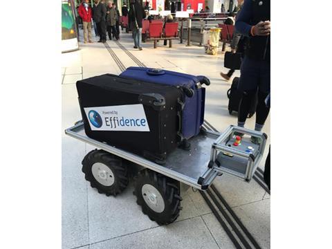 A robot luggage trolley is being tested in Paris.