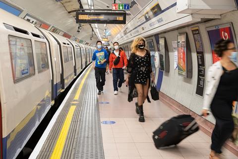 Passengers on London Underground's Piccadilly Line wearing coronavirus face coverings