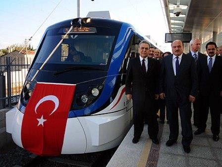 TCDD General Manager Suleyman Karaman and other officials at the launch of commuter services to Aliaga.