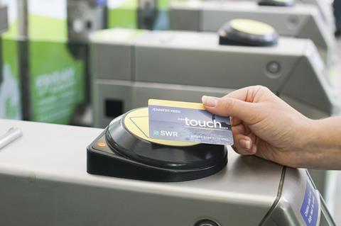 Smart card being used at a ticket gate