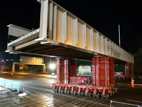 Bridge for Manchester Metrolink's airport route being moved into place over the M60 motorway.