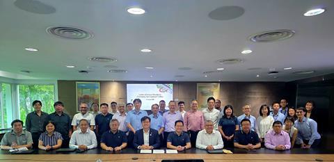 Representatives from LTA and ST Engineering Urban Solutions at the contract signing