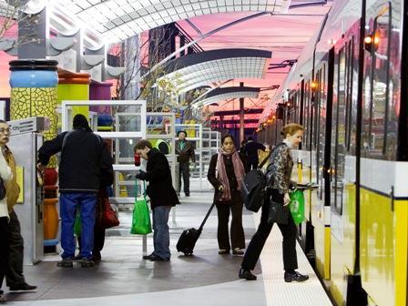 Early morning commuters board the Green Line at North Carrollton/Frankford Station on December 6 (DART).