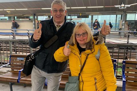 Kate Brackley, Learning Disability Advisor at Bild celebrates with Andrew Lee, Director at People First after travelling on the Tube on her own for the first time