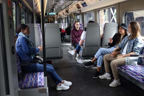 Elizabeth Line passengers on a Class 345 EMU (Photo TfL)