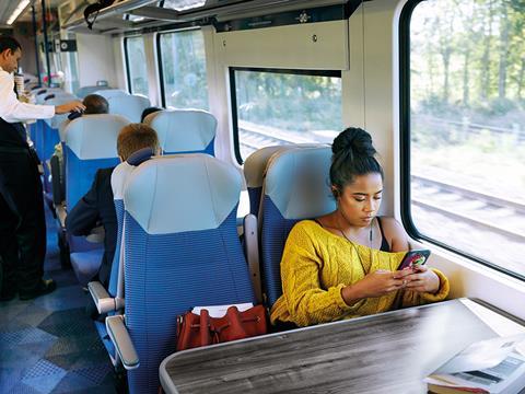 Passenger using mobile phone