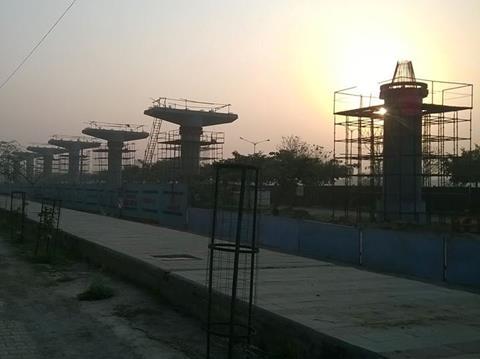 The elevated line is under construction between Noida and Greater Noida.