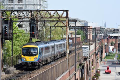 Transpennine Express Class 185 DMU heads through Castlefield towards Manchester Piccadilly (Tony Miles)