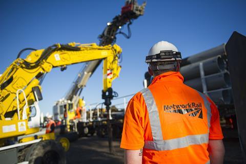 Network Rail engineering works and worker with hivi (Photo Network Rail)